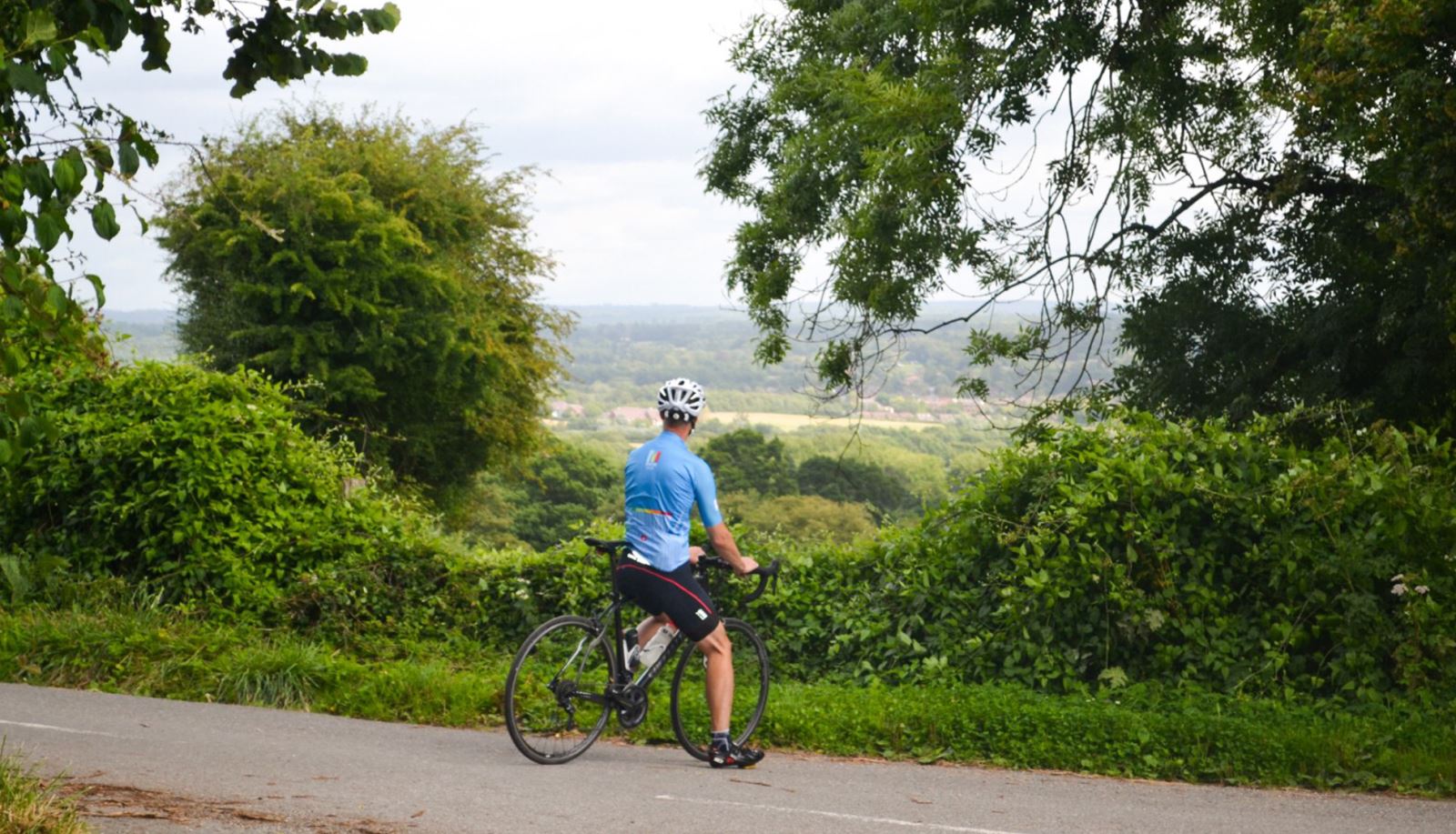 Cyclist at Ashford Hangers in East Hampshire